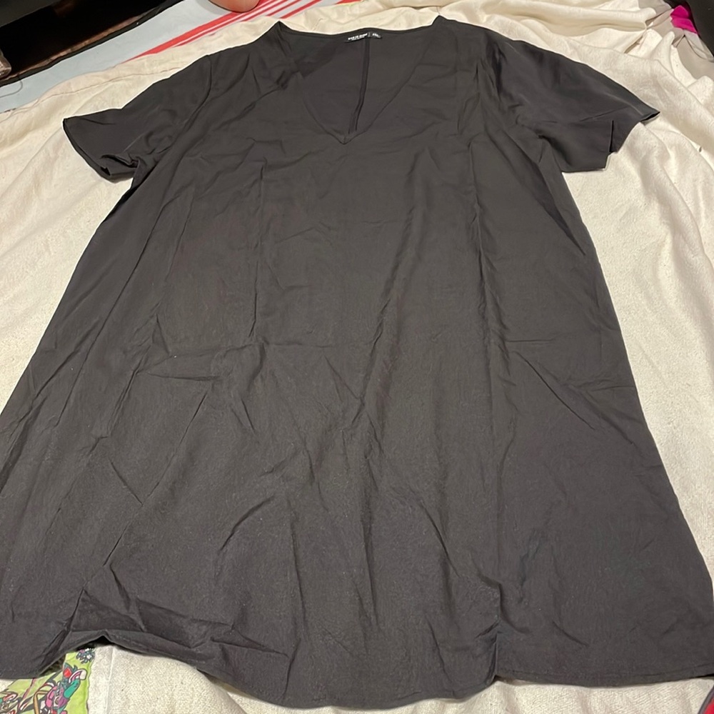 Brand new, never worn V-neck black midi dress from Shein.